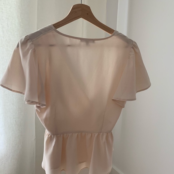 Deep V, Peplum blouse with flutter sleeve - Picture 2 of 4